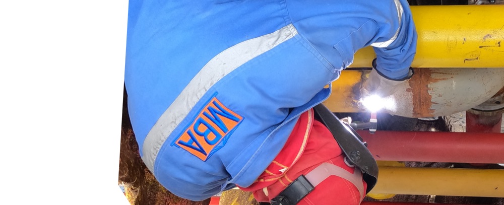 MBA welder working on site
